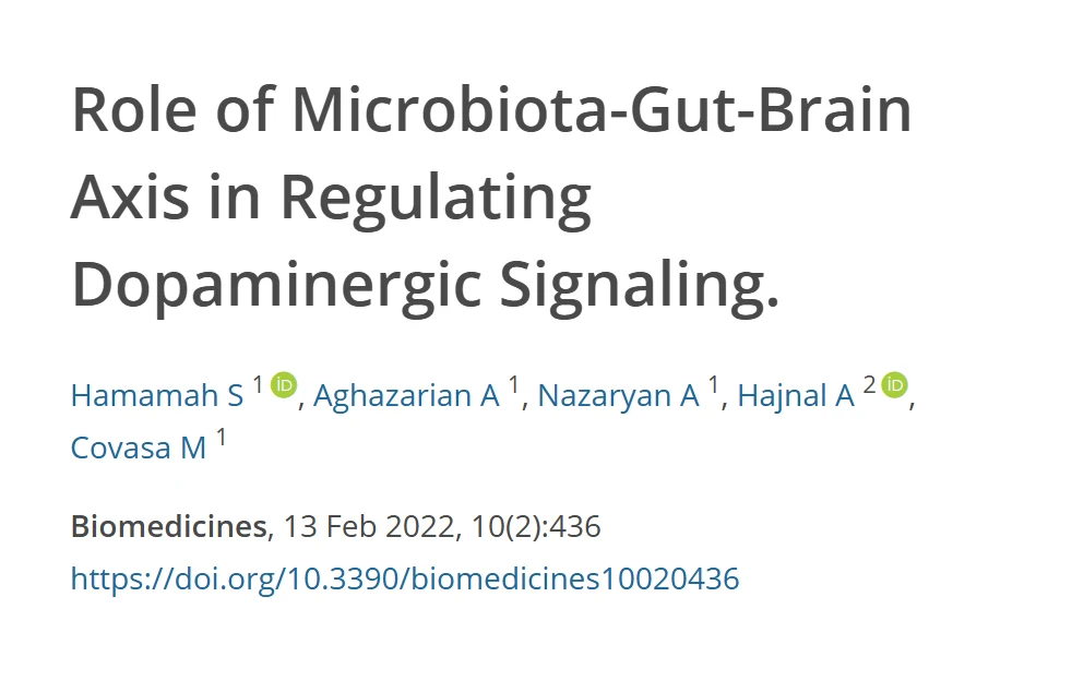Referência da revisão sobre o papel do eixo microbiota-intestino-cérebro na regulação da sinalização dopaminérgica, com título, autores, revista e DOI